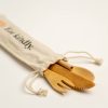 Bamboo fork, spoon, knife, and straw. With beige carry bag that has the AA logo in orange and the words 'Eat kindly.'