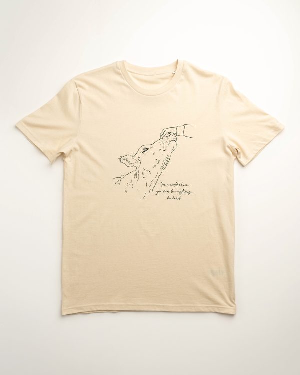 Front image of 'Kindess' unfitted tee. Hand patting cow sketch and phrase 'In a world where you can be anything, be kind'