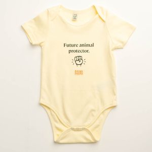 Baby onesie - ecru colour. Pic of a fist, Animals Australia logo and 'Future animal protector.'