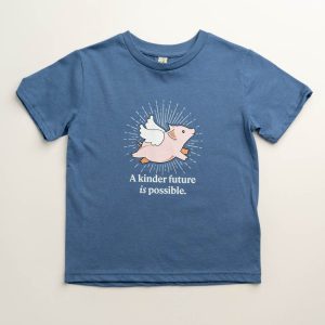 Blue kids shirt with a pic of a flying pig on it and the phrase 'A kinder future is possible.'
