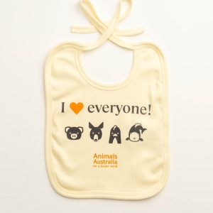 Ecru coloured baby bib with four cartoon animal faces - a pig, a kangaroo, a chicken and a fish - and the Animals Australia logo. Quote - "I "heart" everyone"