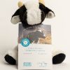 Plush calf with the adoption certificate sitting in front of it