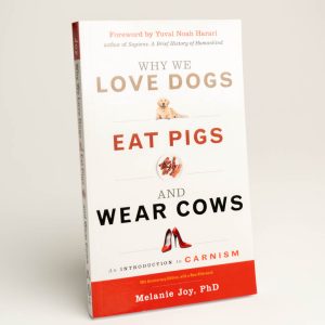 Book cover "Why we Love Dogs, Eat Pigs, and Wear Cows" by Melanie Joy