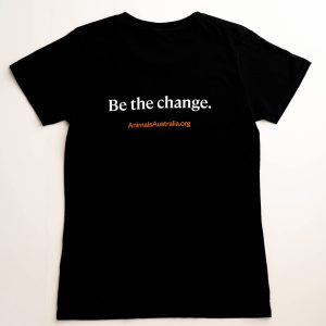 Back of black tee with the Animals Australia website and a quote - "Be the change."
