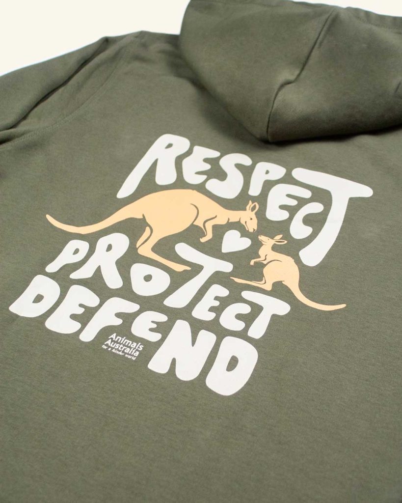 A close up of the back of the hoodie, to show the details of the design which features two kangaroos looking at each other with the words 'Respect protect defend' surrounding them in organic bubble lettering style.