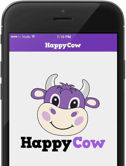 Picture of smart phone showing the Happy Cow app