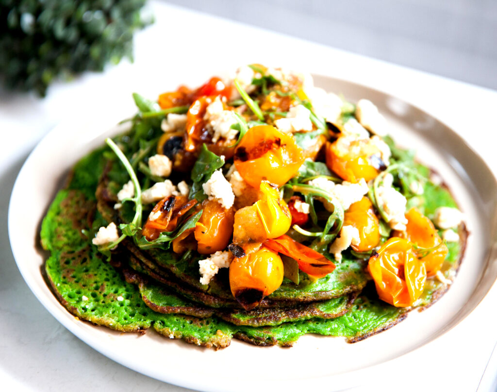 Spinach Pancakes with Blistered Tomato & Rocket Salad recipe
