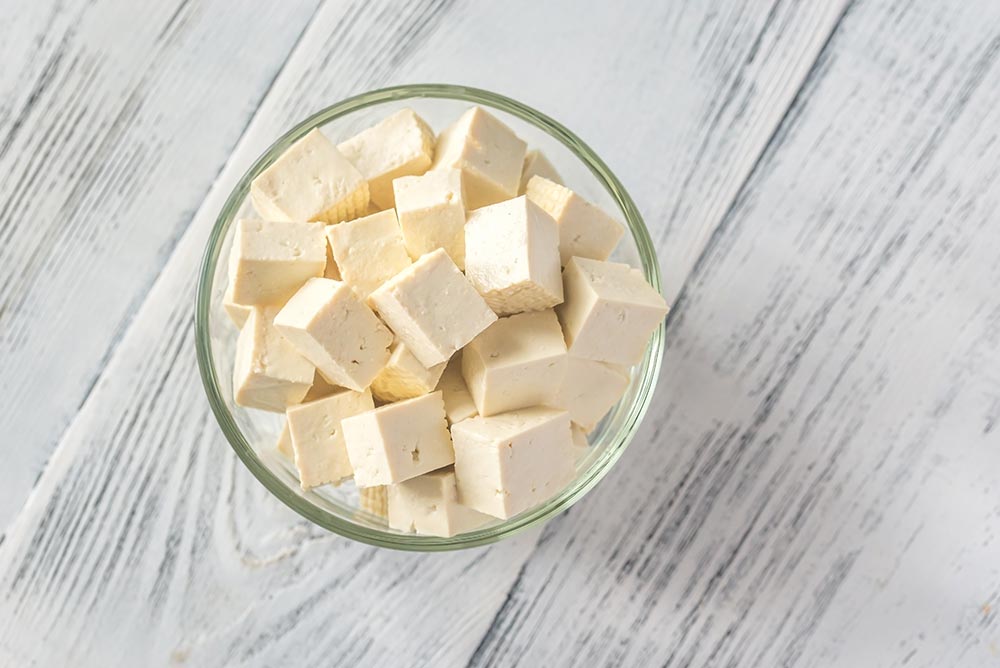 Cubed tofu in a bowl.